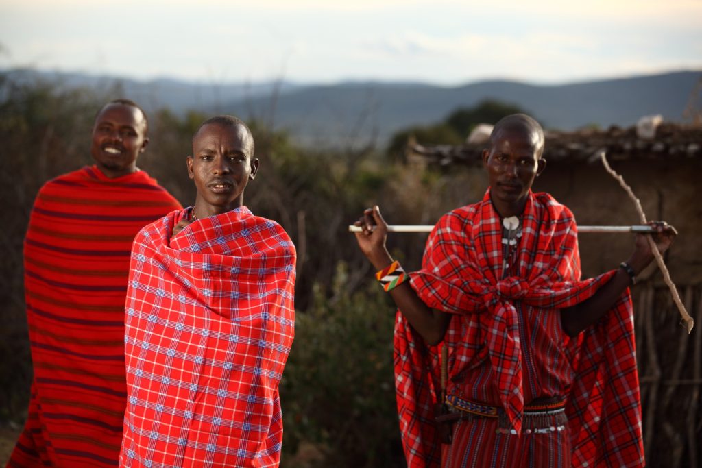 Maasai men in their shuka in Kenya. Their cultural practices have promoted cultural tourism in Kenya widely.